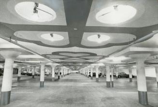 Cluster skylights and art work enhance parking areas (Clarkson, Ontario)