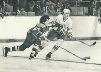 Clutch and garb, Indianapolis Racers' Ken Block (24) tries to fend off Toros' Vaclav Nedomansky by grabbing his sweater in one of the infrequent excit(...)