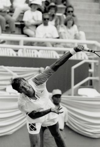 Killer Serve, Toronto's Daniel Nestor puts his power into it yesterday on his way to beating Bjorn Borg in exhibition