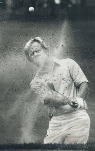 Occupational hazard, Jack Nicklaus blasts out of one of the myriad bunkers he designed at Glen Abbey, this one on the fourth hole. The Golden Bear car(...)