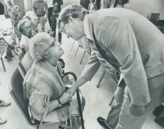 85-year-old Ethel Steele gets a chuckle out of Liberal Leader Robert Nixon yesterday in Cummer House senior citizens' residence by telling him, I hear(...)