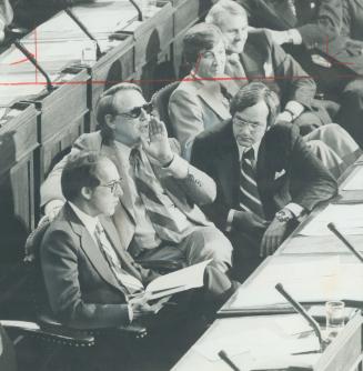 Former liberal leader Robert Nixon (middle) heckles the Conservative benches during the budget speech as Liberal Leader Stuart Smith (left) and David (...)