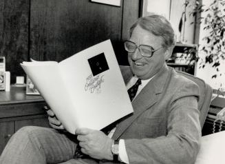 The taxman cometh, Treasurer Robert Nixon has a few laughs during a pre-budget photo session yesterday at Queen's Park