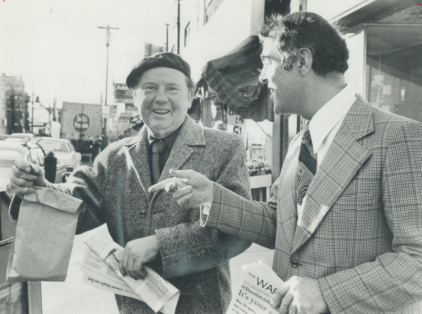 Campaingning for Alderman in Ward 2, Tony O'Donohue (right), who ran for mayor of Toronto two years ago, talks with passersby along Queen St. W. The s(...)