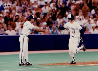 A Homer, John Olerud celebrates his second home run last night