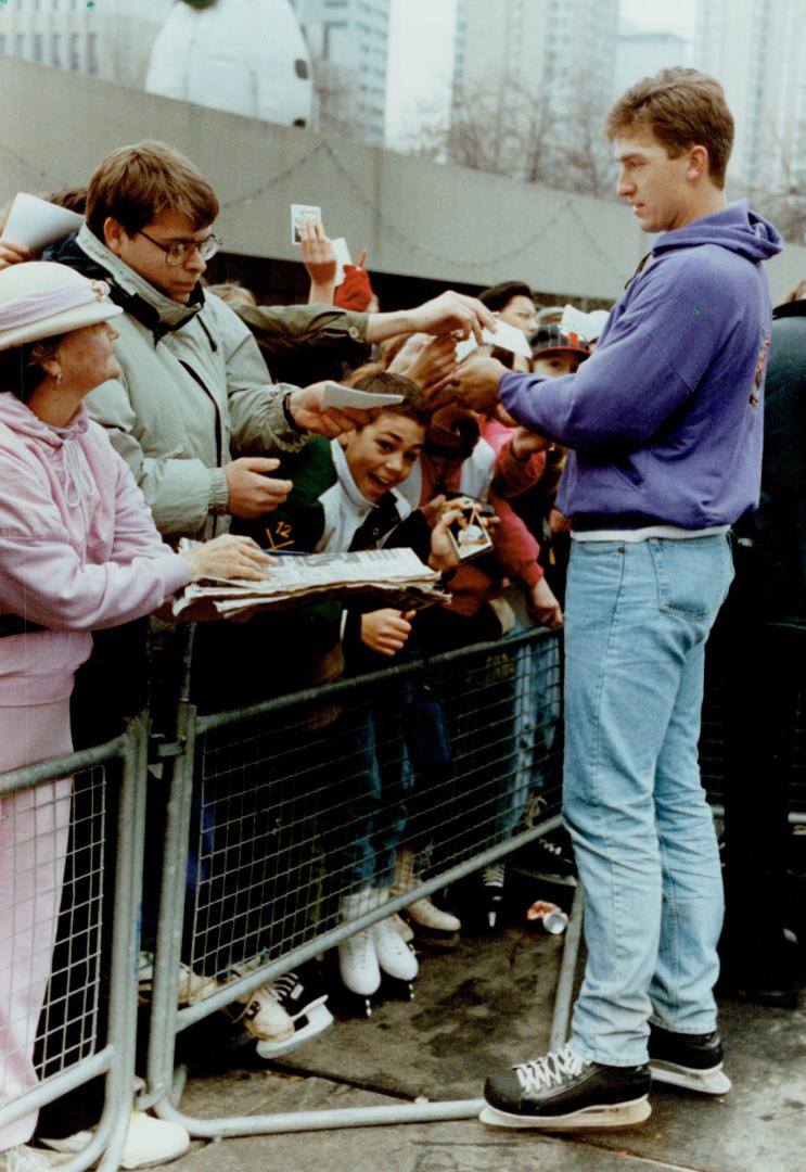 Olerud on skates, Blue Jay first baseman John Olerud takes a break from his skating exploits at Nathan Phillips Square to sign autographs