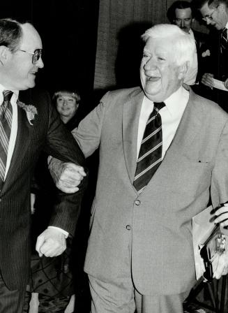 Happy visitor, Former U.S. House leader Thomas (Tip) O'Neill has time for a laugh at the Sheraton Centre where he told luncheon guests Canada will have to give during free trade talks