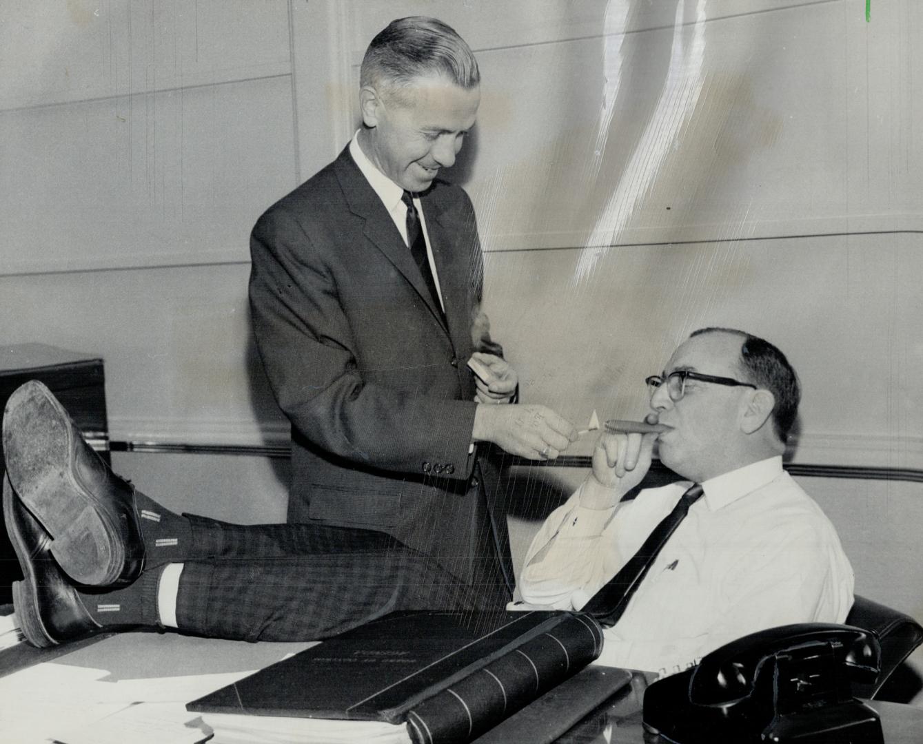 Feel right at home. His feet up on the desk, new Controller Herbert Orliffe settles back comfortably in William Allen's former chair and accepts a lig(...)