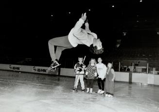 Dazzler, Brian Orser gives Erick Bauer, 8, Allegra Jones, 5, and Lindsay Arnold, 6, a Stars On Ice Preview