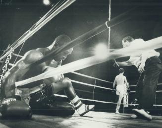 Goodnight, Junior, Shawn Sullivan heads for the nuetral corner and the referee heads for 10 as (Junie) Nash of Philadelphia tries to collect his thoug(...)