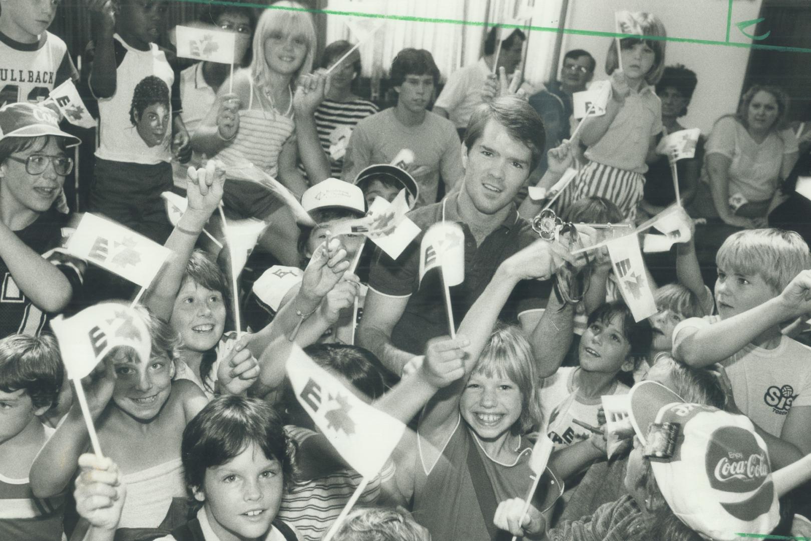 Not just a face in the crowd. Boxer Shawn O'Sullivan is surrounded by a throng of cheering supporters at East York Municipal Offices yesterday. Major (...)