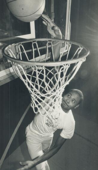 High-jumping slam-dunker, Milt Ottey, who holds the Commonwealth high jump record of 2