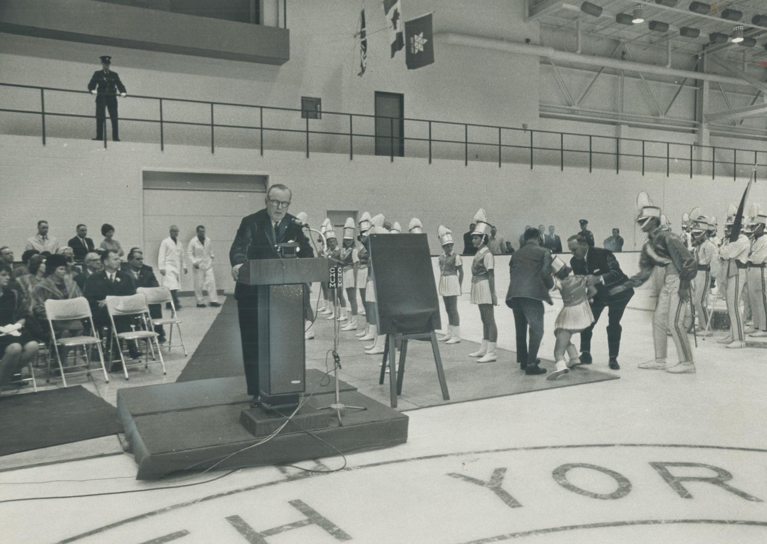 In middle of Pearson's speech, a 14-year-old member of north york lions majorette corps, Joanne Graff, faints