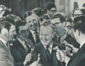 Grinning happily but still talking cautiously after close of yesterday's session of Parliament which debated motion of confidence in government, Prime(...)