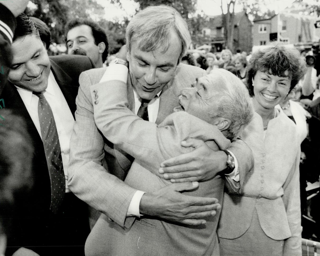 An armful, Liberal leader David Peterson gets a warm welcome as he mainstreets yesterday on the Danforth in Riverdale riding. Peterson, who was campai(...)