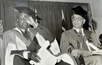 A tear of happiness, World famous Canadian jazz pianist Oscar Peterson yesterday wiped away a wee bit of a tear after receiving an honorary doctor of (...)