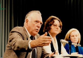 Women warned, Ontario Federation of Labor president Cliff Pilkey and vice-president Julie Griffin warn the province's women to speak up for full equal-pay legislation at a press conference yesterday