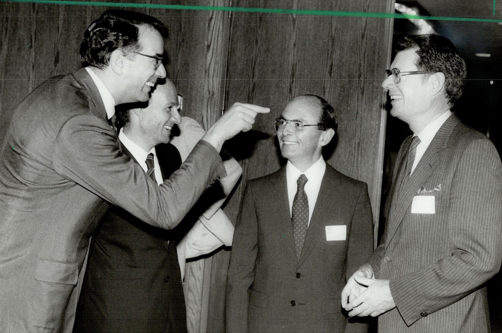 Board chat, From left, Senator Michael Pitfield, appointed to Cadillac Fairview's board of directors at developer's annual meeting yesterday, chats wi(...)