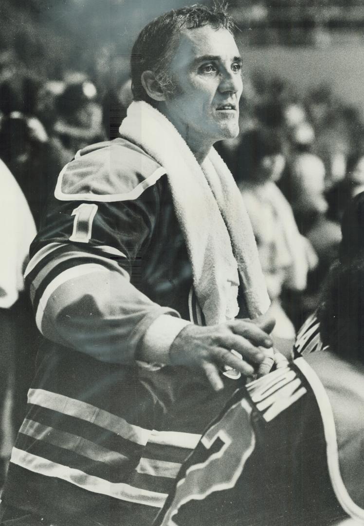 Venerable Jacques Plante, 45, watches third period of Edmonton Oilers' 8-2 rout of Toros last night at Gardens