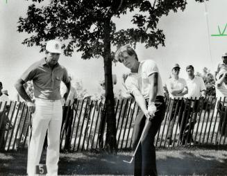 Like father like son, Gary Player, left, watches the form of his son, Wayne, 21, during practice yesterday for the Canadian Open. Gary says his son de(...)