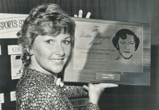 The fairest of them all, Oakville native Sandra Post proudly displays the Bobbie Rosenfeld Award as the outstanding Canadian female athlete of 1979. P(...)