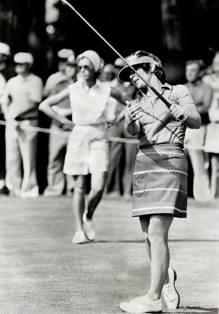 On its way, Canadian golfer Sandra Post follows through on shot during play in $100,000 tournament at St