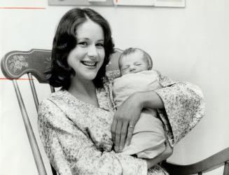 A bouncing boy. One of the National Ballet's principal dancers, Nadia Potts, cuddles her newborn son, Alexander Robert, named for the ballet's artisti(...)