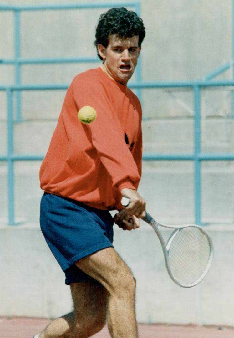 A swinging good time. Oakville's Chris Pridham, Canada's topranked male tennis player, practises his backhand at the National Tennis Centre. Pridham q(...)