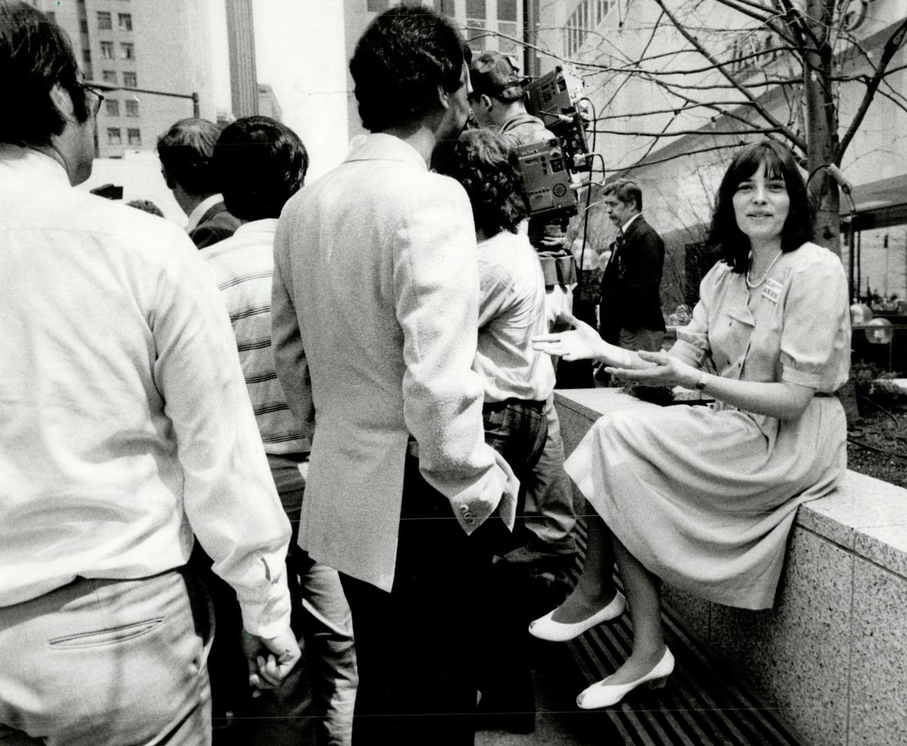 Captive audience, Arlene Perly Rae is backed into a quiet corner as husband and New Democratic Party leade Bob Rae holds a press conference outside th(...)