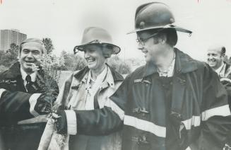 A spray, but not for a fire. It takes more than a spray of goldenrod to put out a fire but Controller Joyce Trimmer gets a kick out of the presentatio(...)