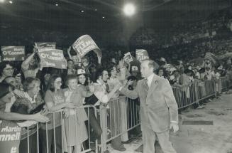 Barricades hold back Trudeau wellwishers at a giant Liberal rally in Maple Leaf Gardens