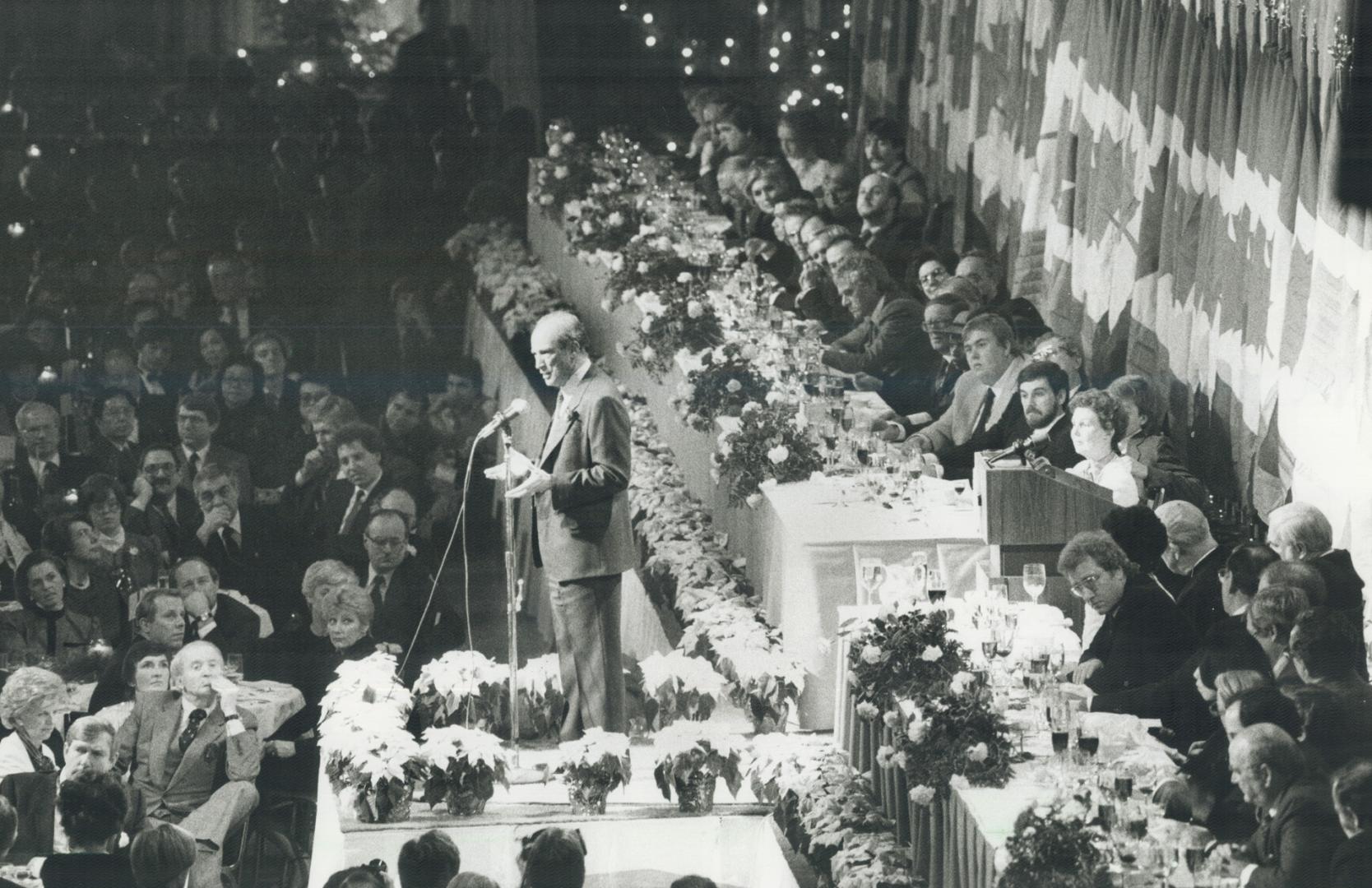 Star among stars: Prime Minister Pierre Trudeau is surrounded by dozens of Canada celebrities as he speaks to an audience of almost 4,000 people at the bigget fund-raising dinner ever held in Canada