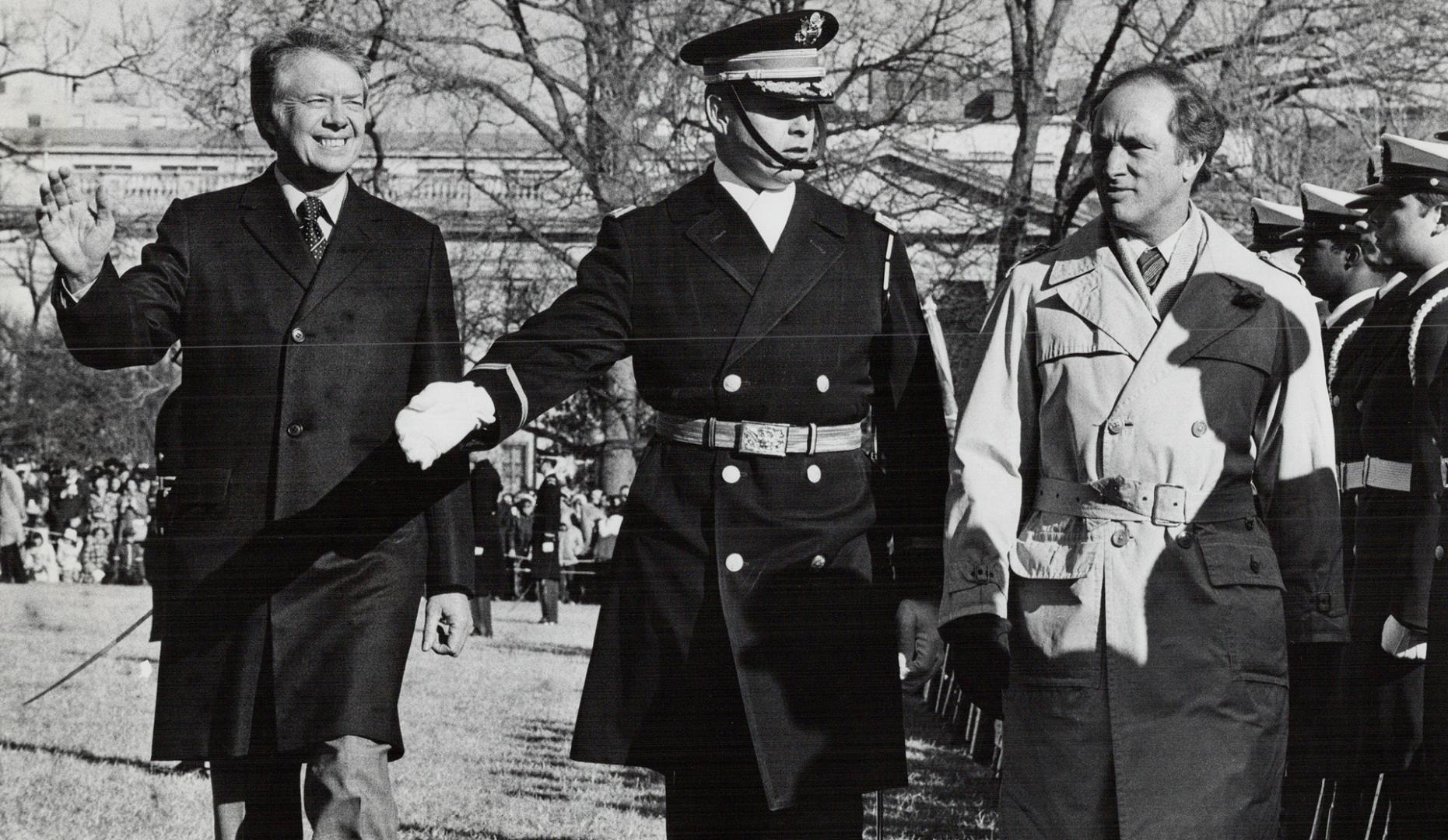 President Carter and Prime Minister Pierre-Elliott Trudeau reviewing troops in Washington Monday