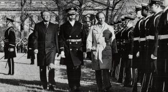 President Carter and Prime Minister Trudeau reviewing troops in Washington Monday