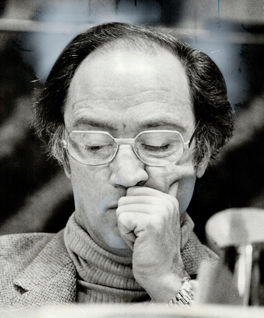 In a contemplative mood, Prime Minister Pierre Trudeau listens to speaker's comments yesterday as final reports are given at Liberal policy conference(...)