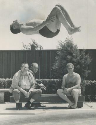 Taking a flip-and-a-dip. Prime Minister Pierre Trudeau flips off end of diving board into Canadiana Motor Hotel pool, in Agincourt, yesterday