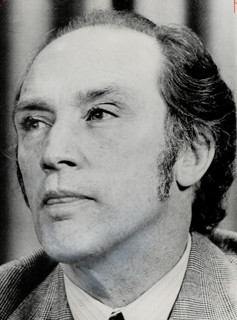 Prime Minister Pierre Trudeau. Bites his tongue in explaining Liberal plans