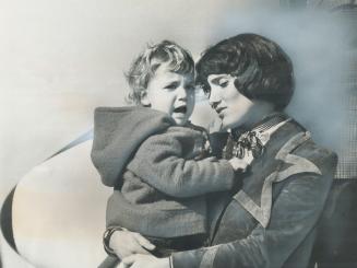 Argaret Trudeau holds her son Justin before she leaves on trip to France