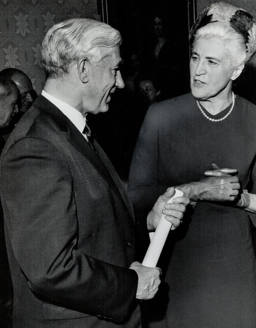 Dr. Albert Trueman and Mrs. George Vanier. His director of Canada Council received honor award