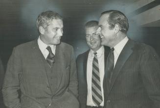 Justice Minister John Turner (left) chats with York North MP Barney Danson (right) before speaking at a $25-a-plate dinner for the York North Liberals(...)