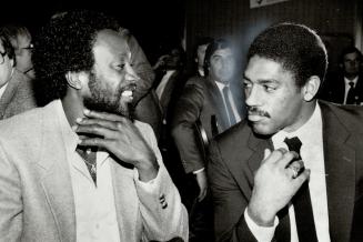 Like it, Willie? Shortstop Alfredo Griffin, left, and first baseman Willie Upshaw seem to be discussing beards yesterday as they attended Blue Jays re(...)