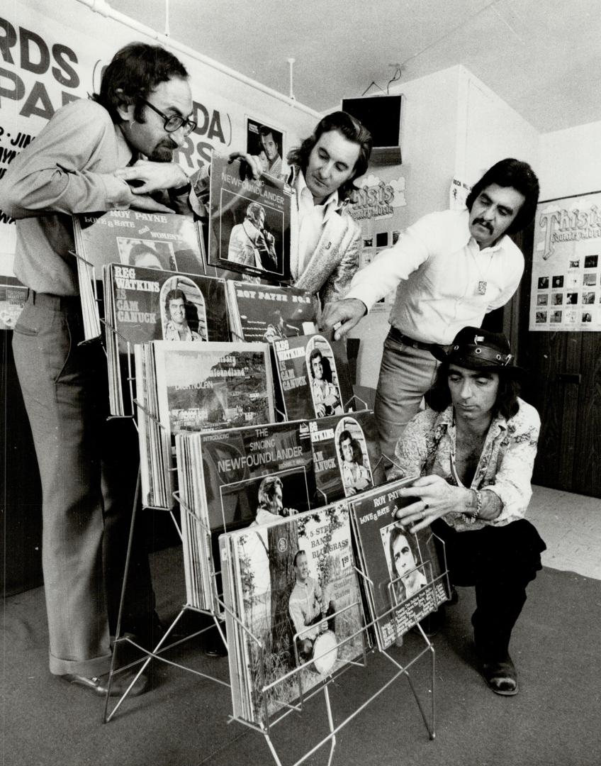 Michael T. Wall, second from left, with reg Watkins and Roy Payne