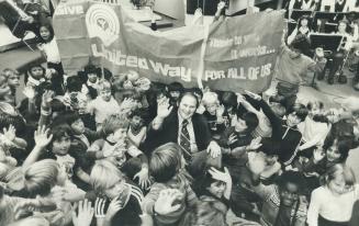 Royal welcome. Television's Al Waxman, King of Kensington, gets a boisterous reception from his fans as he arrives at Scarborough Civic Centre to officially open the borough's United Way campaign