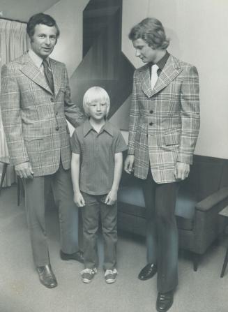 Bill withrow, Director of the Art Gallery of Ontario, models teal blue and yellow plaid sports jacket