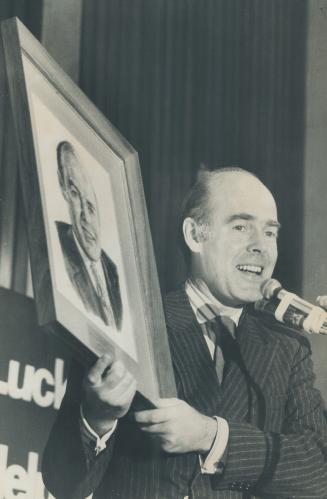 John Worsley with portrait by Irma Coocill given to him at UA luncheon at Royal York