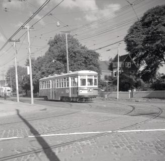 T.T.C., #2714, on Queen Street East, looking west from Connaught Avenue, Toronto, Ontario