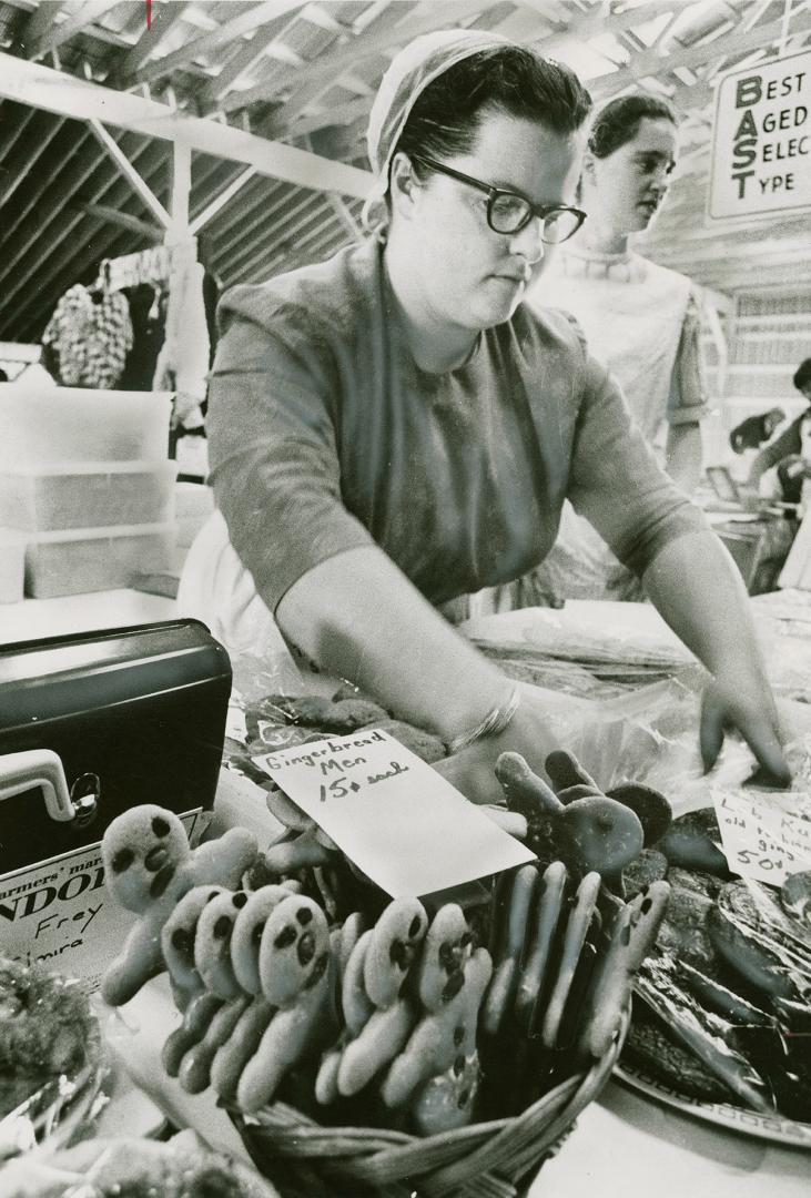 Gingerbread men attract customers of all ages at the new Elmira farmers' market