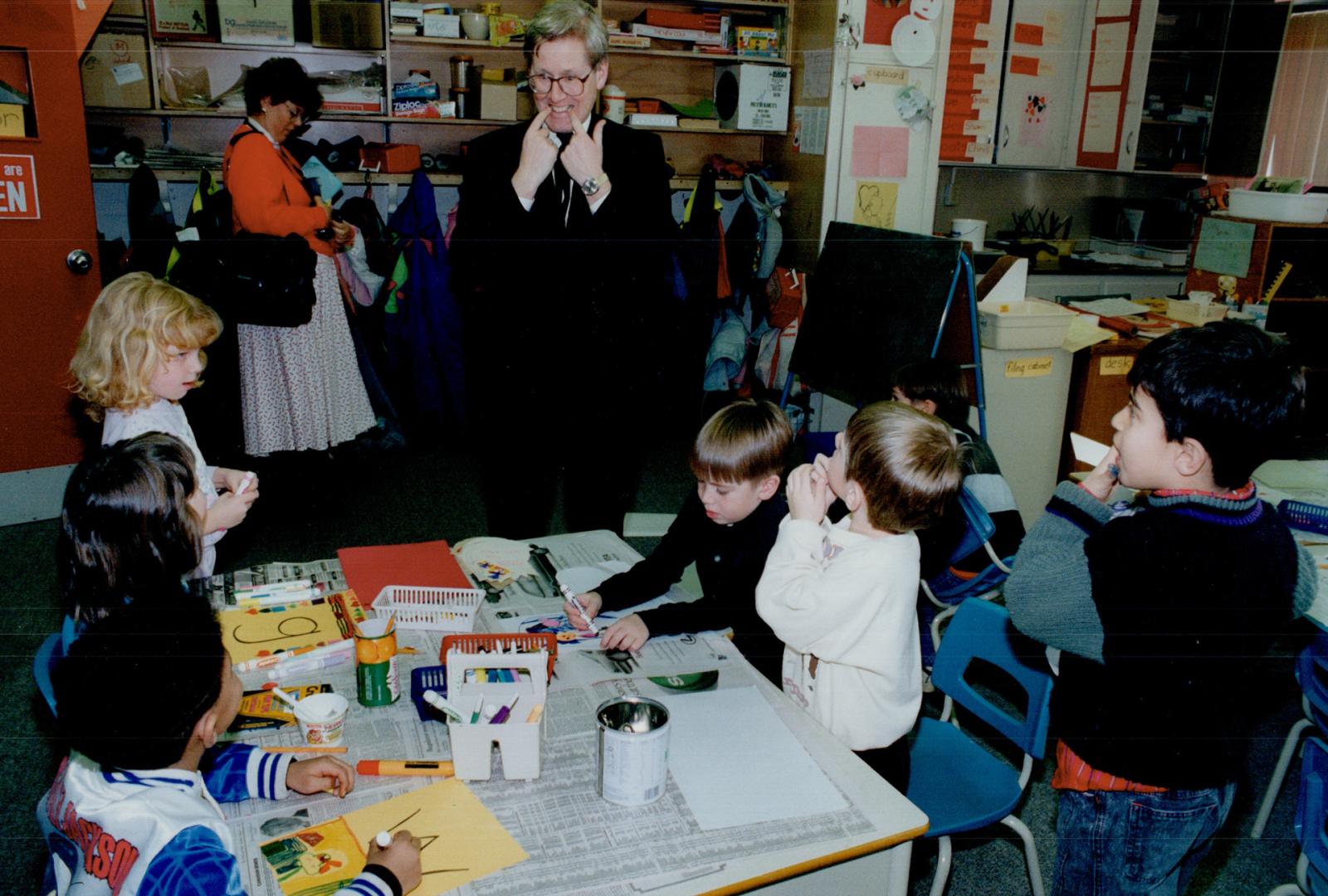 Toothy dialogue: Premier Bob Rae discusses the political implications of the Tooth Fairy with students in Grades 1 and 2 during a visit yesterday to Walter Scott Public School in Richmond Hill