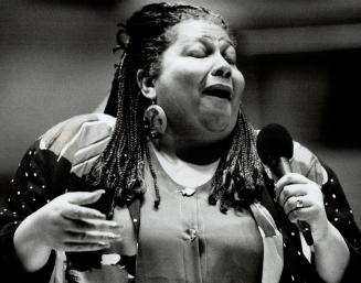 Singer Jackie Richardson puts a gospel twist on Christmas carols at a rehearsal yesterday at Roy Thomson Hall