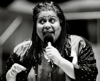 Singer Jackie Richardson puts a gospel twist on Christmas carols at a rehearsal yesterday at Roy Thomson Hall